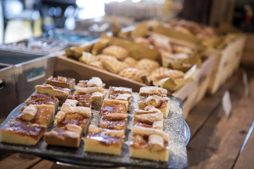 In the image some portions of various kinds of cakes